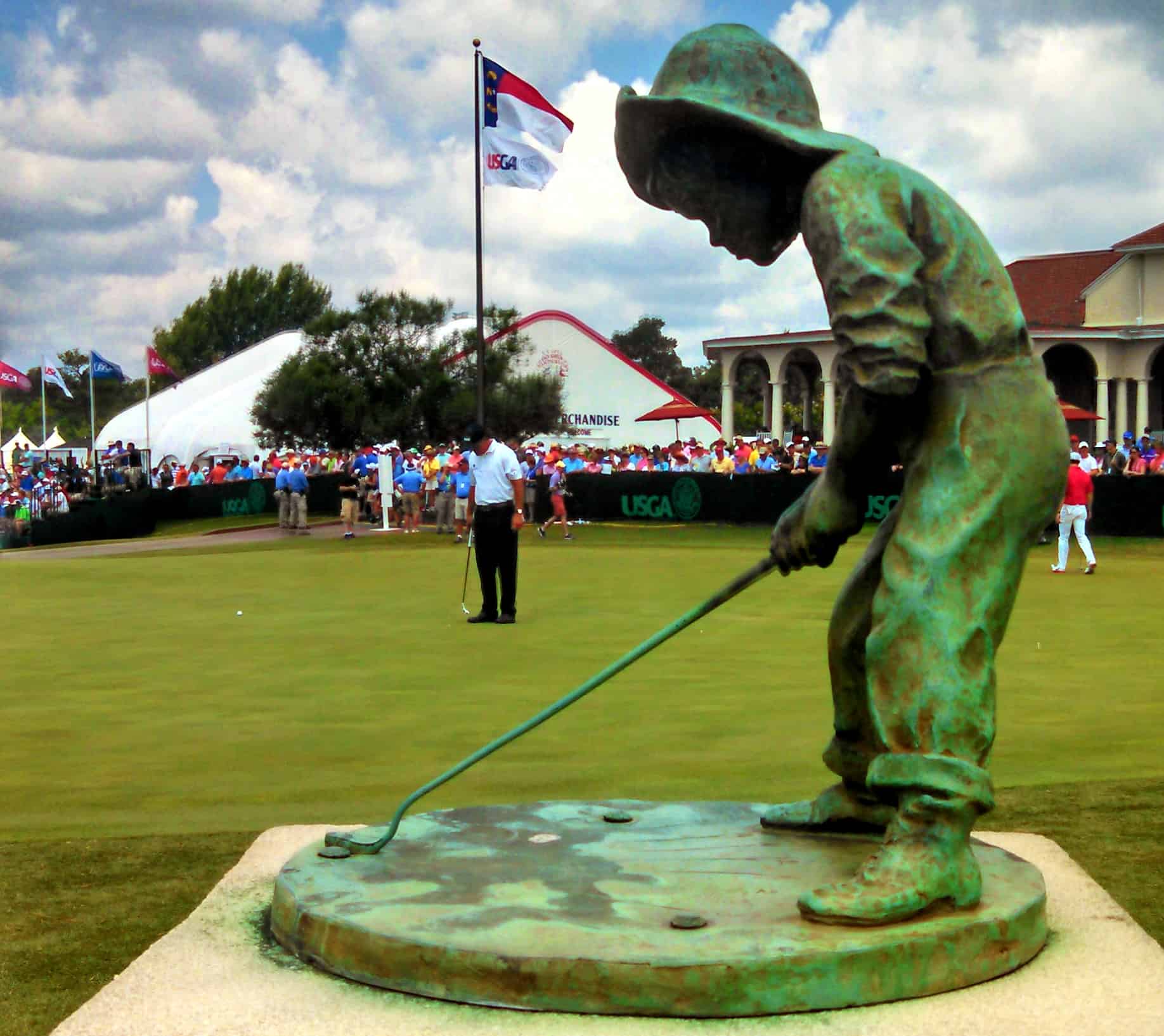 Phil Mickelson putts near Pinehurst’s iconic Putter Boy statue on Friday of the 2014 U.S. Open.