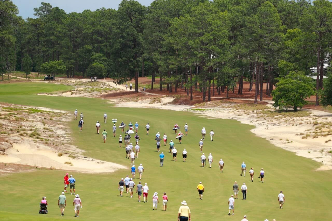 The gallery following the players down the fourth fairway during the final round of match play at the 2017 U.S. Amateur Four-Ball at Pinehurst Resort & Country Club in Village of Pinehurst, N.C. on Wednesday, May 31, 2017. The gallery continued to grow throughout the match. (Copyright USGA/Chris Keane)