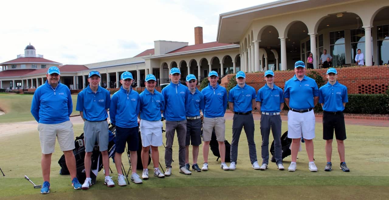 The East Lothian Junior Golf League from Scotland stands at the clubhouse before playing a match against Pinecrest High School on Pinehurst No. 2. Harry Rogan is second from right.