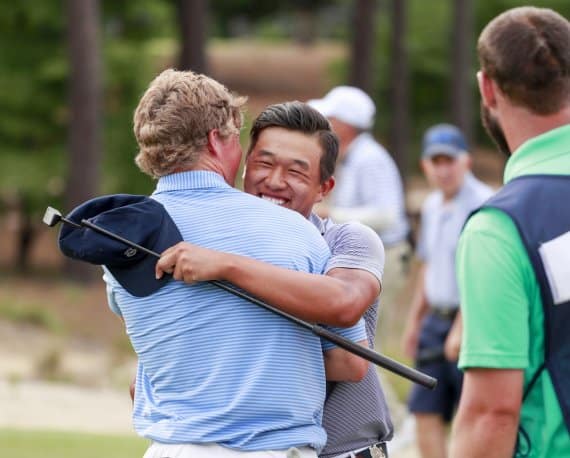 Ben Wong celebrates winning the 2017 U.S. Amateur Four-Ball with teammate Frankie Capan at Pinehurst.