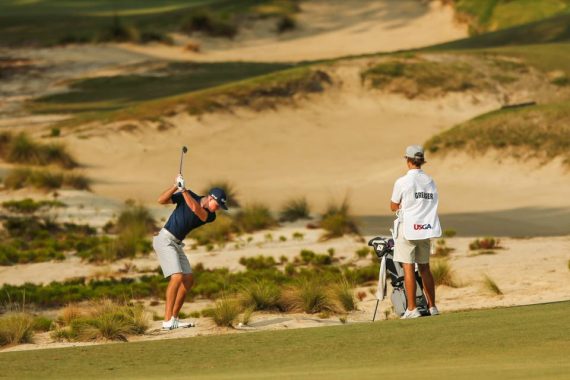 Austin Greaser hits a shot on the fifth hole during the second round of stroke play at the 2019 U.S. Amateur at Pinehurst Resort & Country Club (Course No. 2) in Village of Pinehurst, N.C. on Tuesday, Aug. 13, 2019. (Copyright USGA/Michael Reaves)