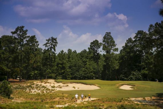 Players walk to the ninth hole during the second round of stroke play at the 2019 U.S. Amateur at Pinehurst Resort & Country Club (Course No. 2) in Village of Pinehurst, N.C. on Tuesday, Aug. 13, 2019. (Copyright USGA/Michael Reaves)