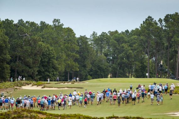 Fans walk down the fairway to the eighth green during the semifinal round at the 2019 U.S. Amateur at Pinehurst Resort & Country Club (Course No. 2) in Village of Pinehurst, N.C. on Saturday, Aug. 17, 2019. (Copyright USGA/Chris Keane)