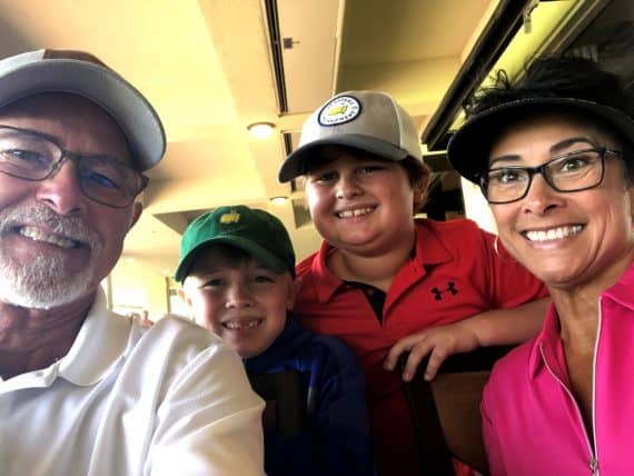 Luke, second from right, celebrates his hole-in-one with his grandparents Ray and Berdi and cousin Cale.