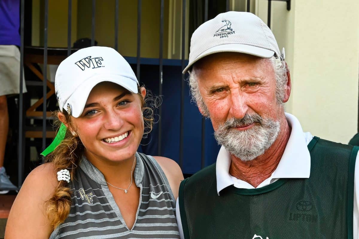 Rachel Kuehn and veteran Pinehurst caddie Keith Silva