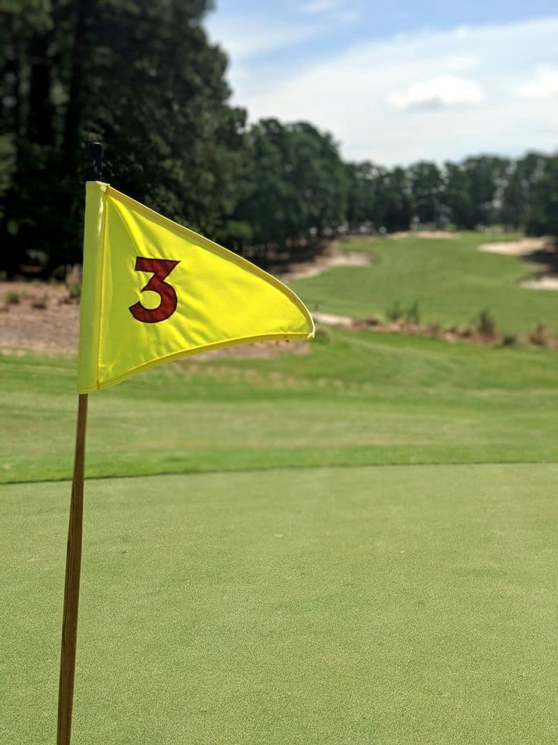 The 16th hole pin flag flies on Pinehurst No. 3.