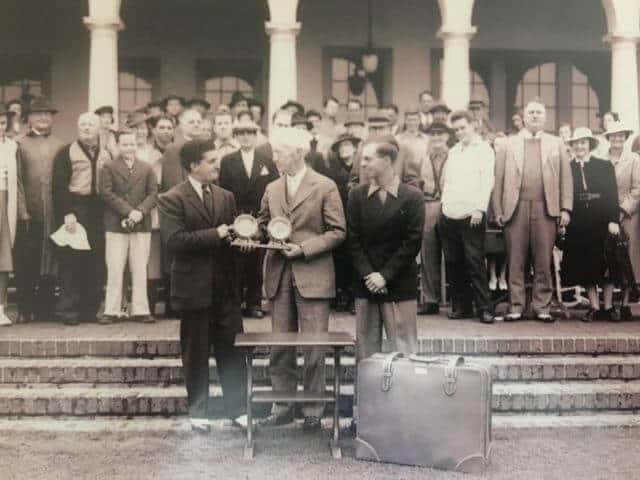 Frank Strafaci, left, after winning the 1938 North & South Amateur, is awarded as the trophy presentation by Kennesaw Mountain Landis.