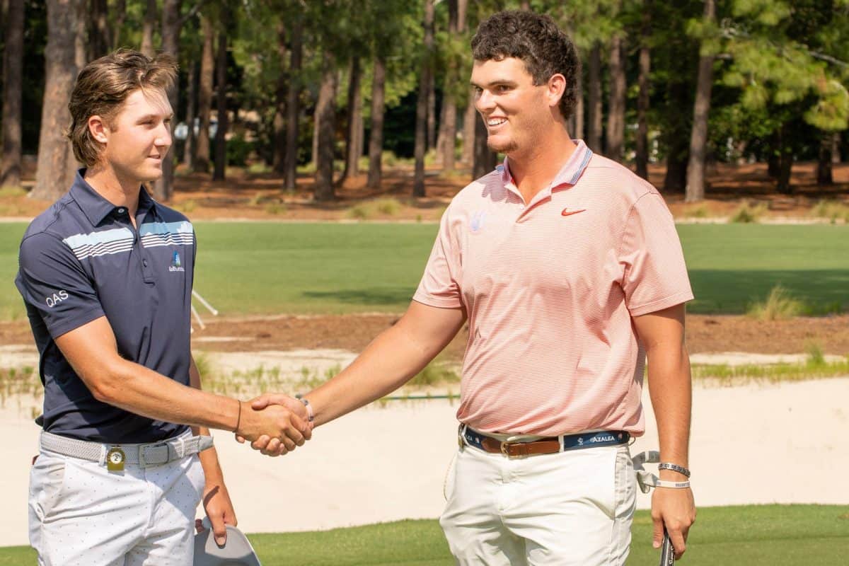 Louis Dobbelaar, left, shakes hands with Zack Gordon after Dobbelaar’s semifinal win in the 121st North & South Amateur. (Photo by John Patota)