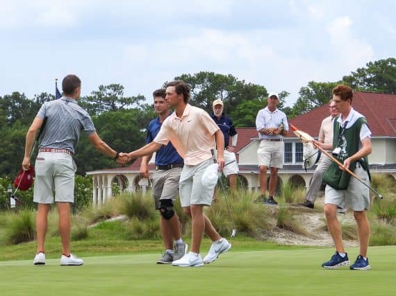 Jackson Van Paris shakes hands with Stanford’s Henry Shimp after the first round of the 2021 North & South Amateur on Pinehurst No. 4 on Tuesday. (Photo by JD Rymoff)