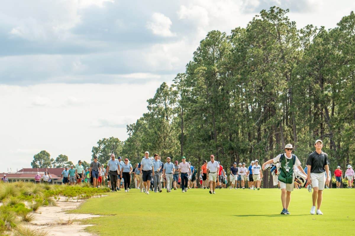 A sizable gallery follows Pinehurst’s Jackson Van Paris during the North & South semifinals. (Photo by John Patota)