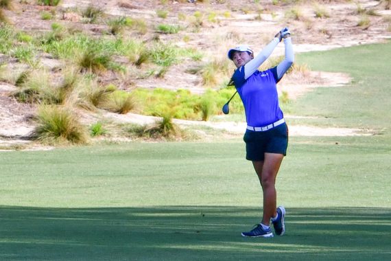 Duke star Gina Kim hits her approach shot on the 10th hole of Pinehurst No. 2 during the 119th Women’s North & South Amateur. (Photo by John Patota)