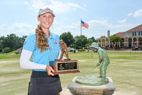 Canadian Brooke Rivers holds the Putter Boy trophy after winning the 43rd Girls’ North & South Junior in 2021. 