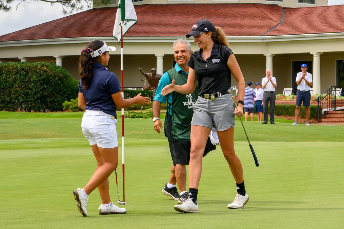 Top-seeded Hannah Levi shakes hands with No. 32 seed Maria Jose Marin after a hard-fought match on Pinehurst No. 2. (Photo by John Patota)