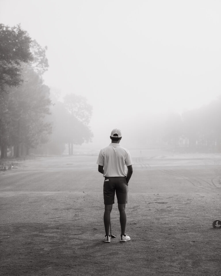 Auburn’s Evan Vo looks out over the first hole of Pinehurst No, 2 in the fog before his Round of 32 match on Thursday. (Photo by Matt Gibson)