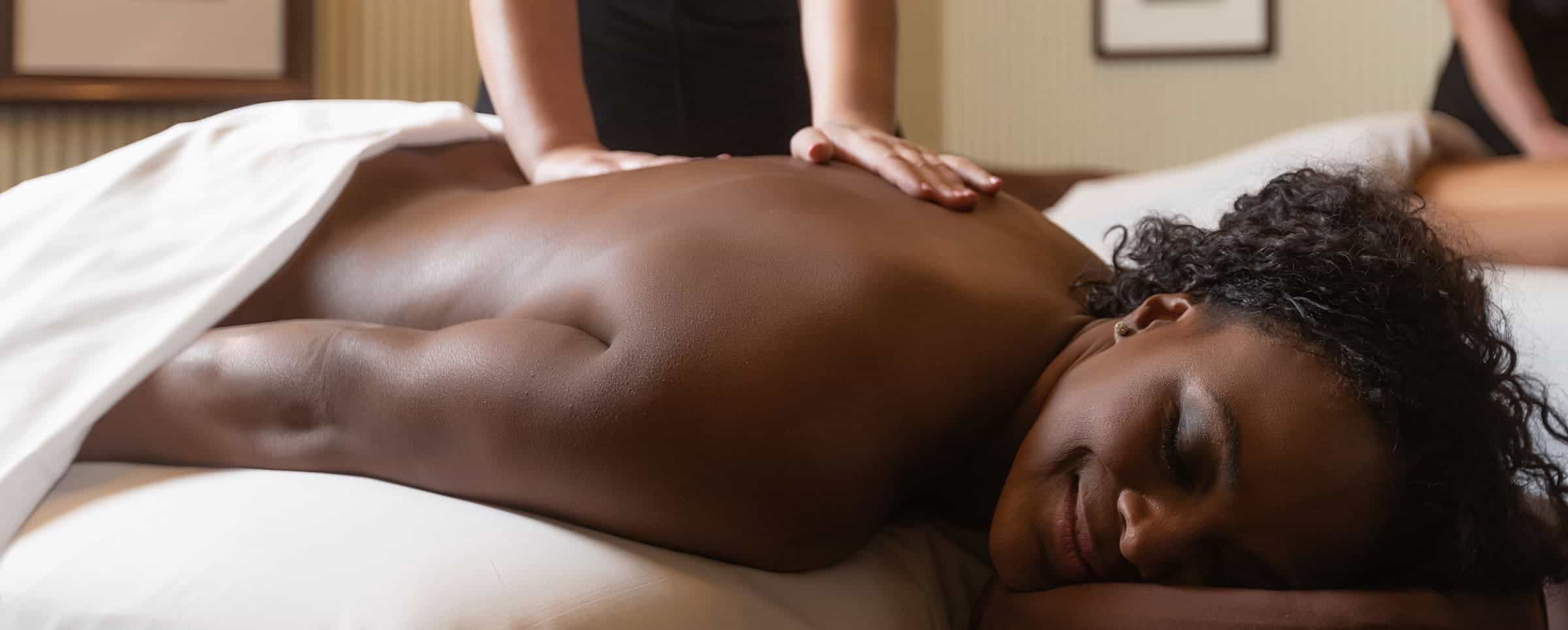 woman enjoying Pinehurst Spa massage services