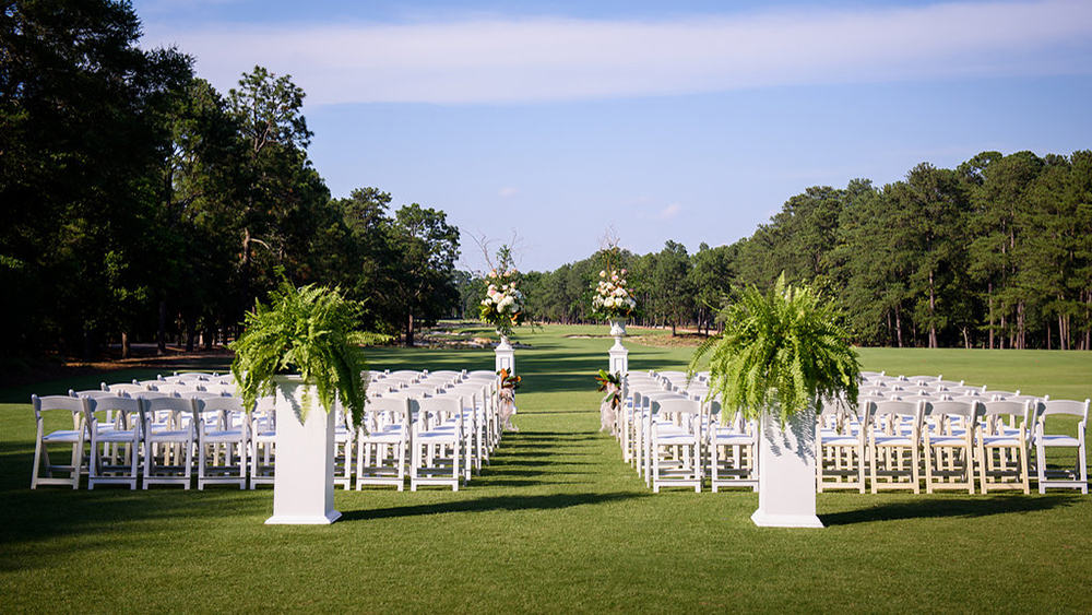 Pinehurst wedding venue outdoor white chairs