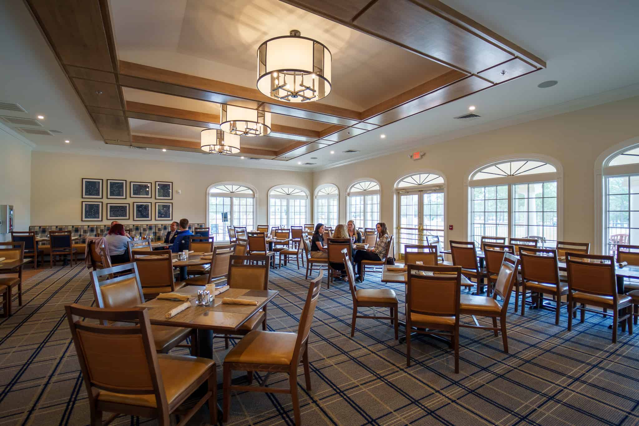 Spacious newly renovated Centennial Dining Room - Indoor and outdoor meeting venue in Pinehurst No 8 Clubhouse at Pinehurst Resort