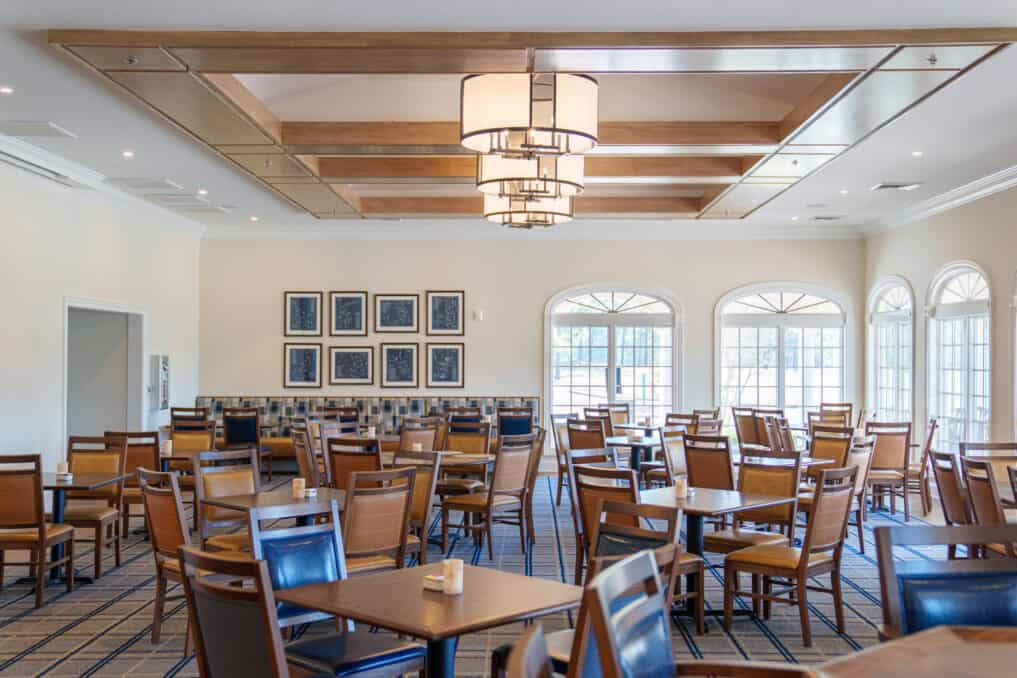 A wider angle photo of the renovated restaurant space at Pinehurst No. 8.