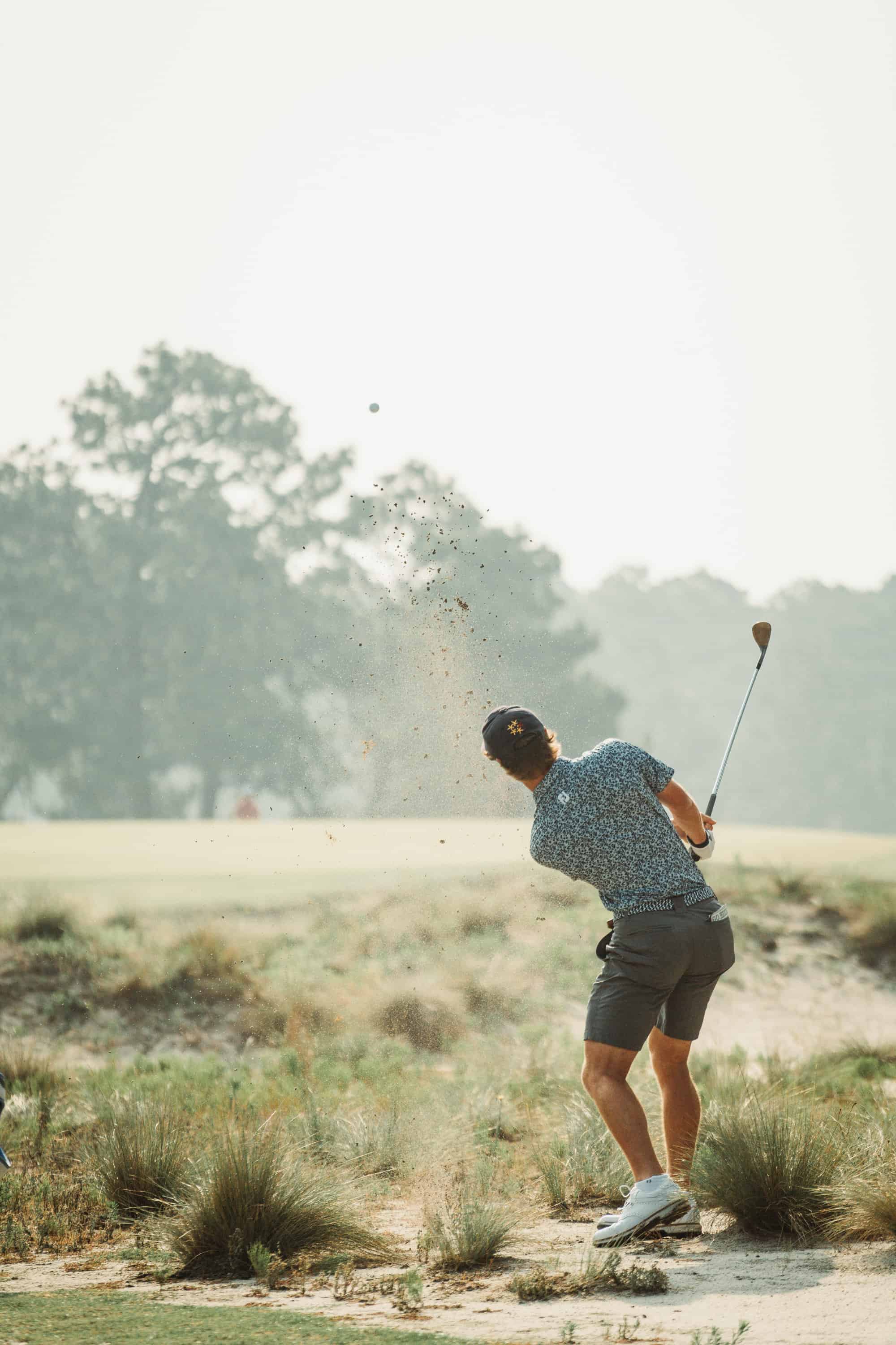 David Ford plays from the native area on Pinehurst No. 2. (Photo by Zach Pessagno)