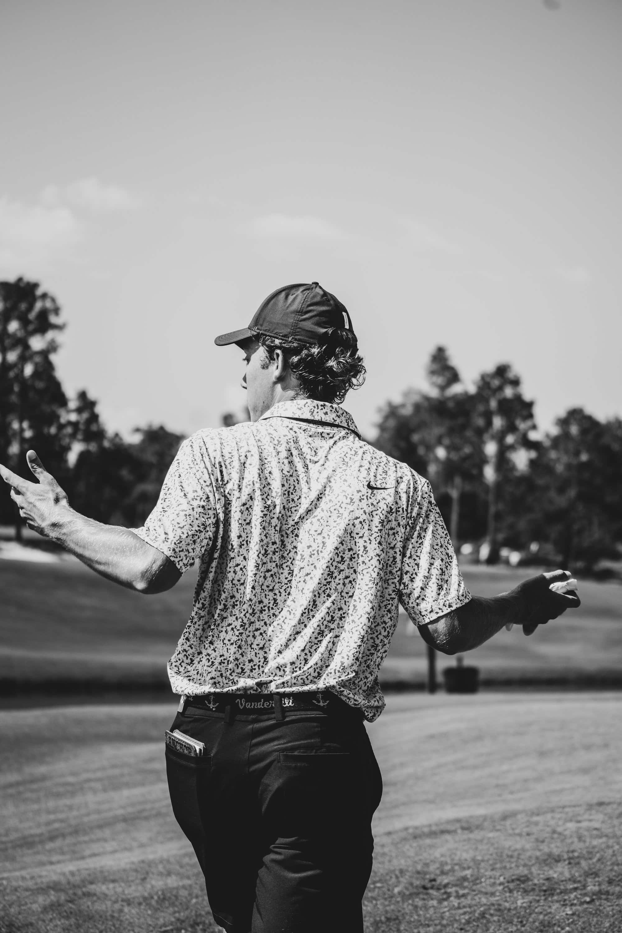 Jackson Van Paris motions back to his caddie during his first-round 61 in the 123rd North & South Amateur on Tuesday. (Photo by Zach Pessagno)