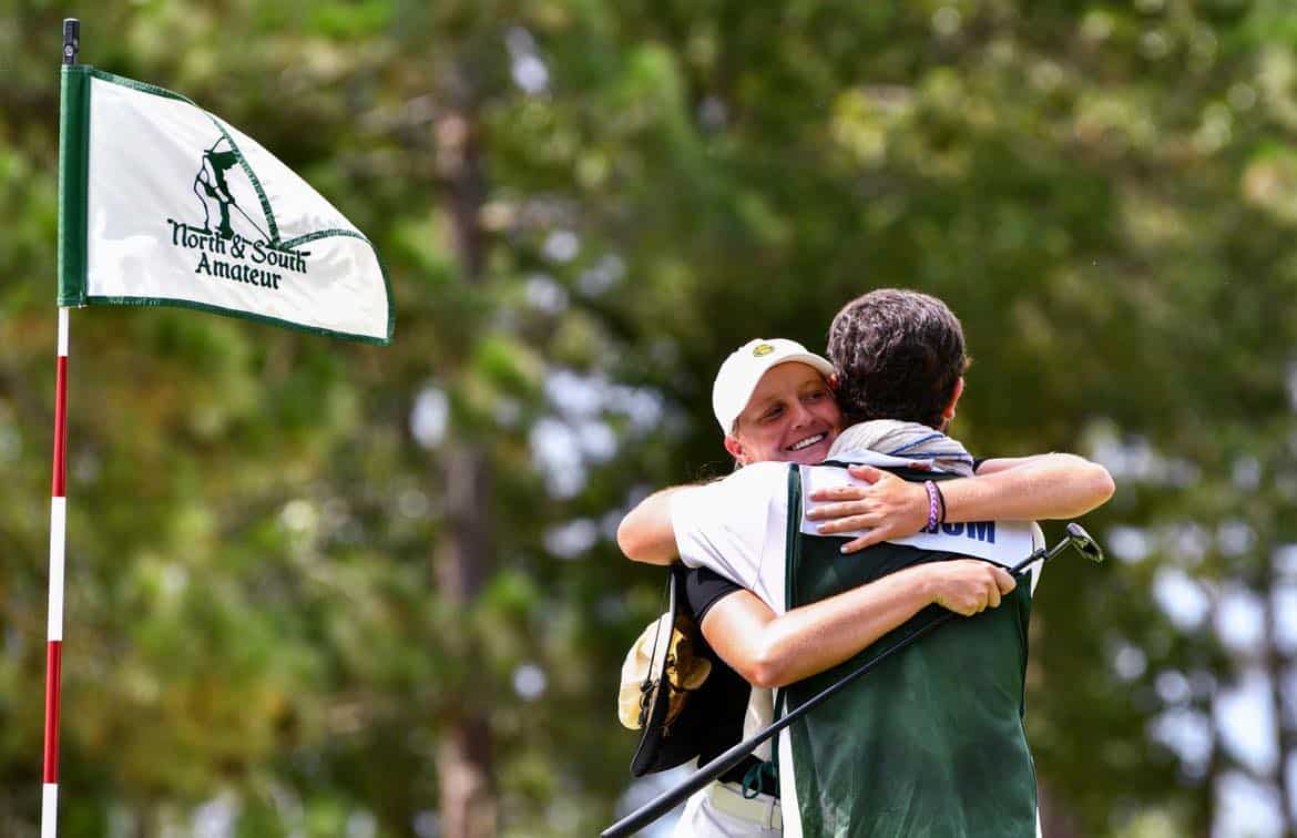 Anna Morgan hugs her caddie Aaron Dittman after winning the Women's North & South Amateur. (Photo by Melissa Schaub)