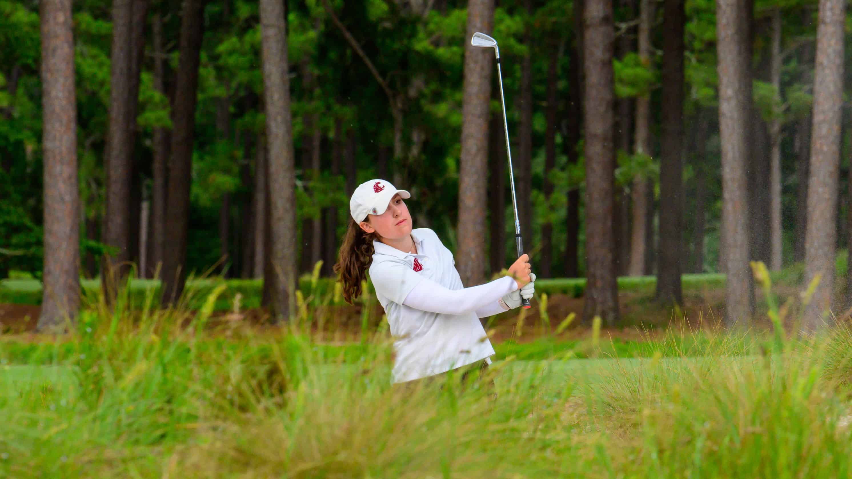 Madelyn Gamble watches her shot on Pinehurst No. 2. (Photo by John Patota)