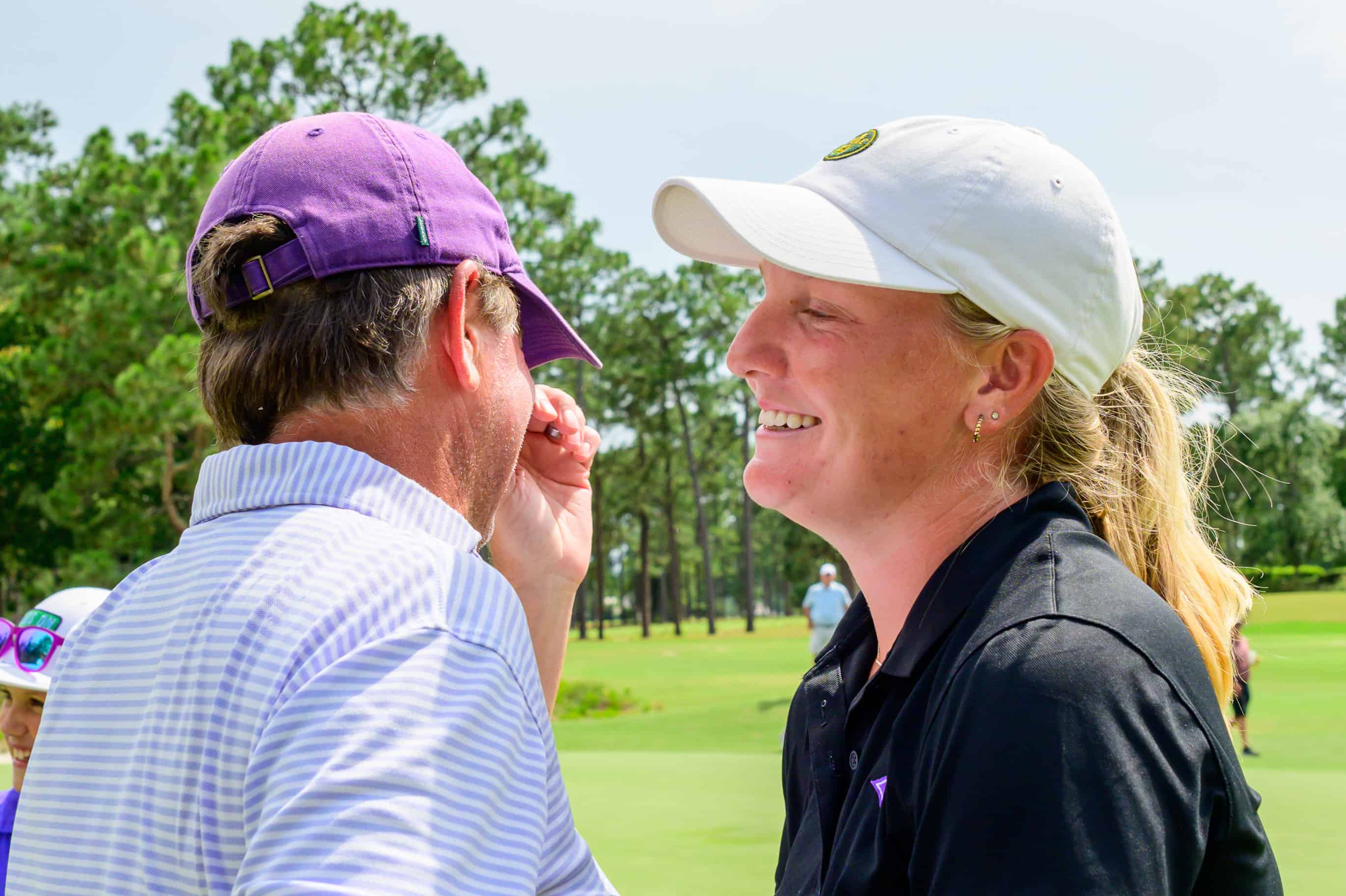 Anna Morgan comforts her father Elford as he wipes away tears following Anna's victory. (Photo by John Patota)