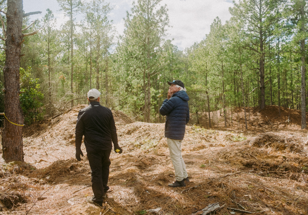 Bill Coore, right, walks the property of Pinehurst No. 11 with Pinehurst Resort Golf Course Maintenance Manager Kevin Robinson.