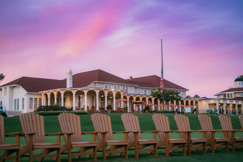 Adirondack chairs at sunset.